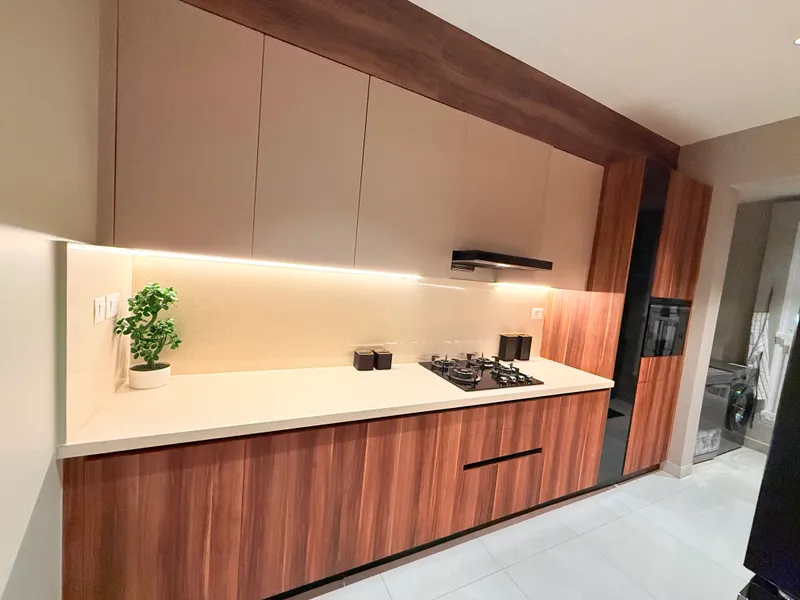 Delivered walnut and champagne kitchen at published rates