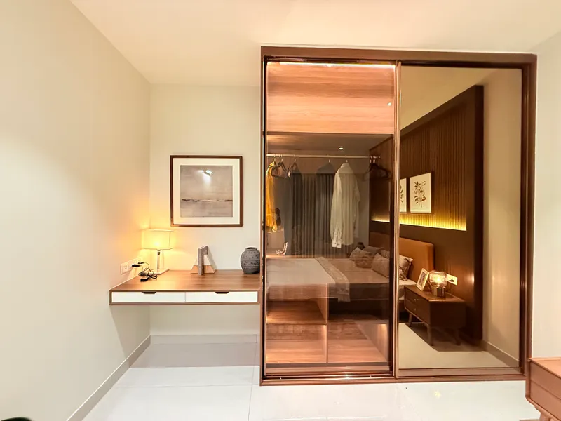 Delivered bronze-glass wardrobe suite
